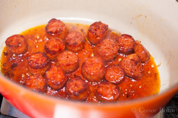 The chorizo releases lots of fat. Enough to fry the onions and garlic.