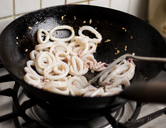 The floppy squid rings go all circular when they start to cook. 