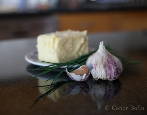 Garlic, chives and butter. The ingredients needed for the garlic and chive butter. 