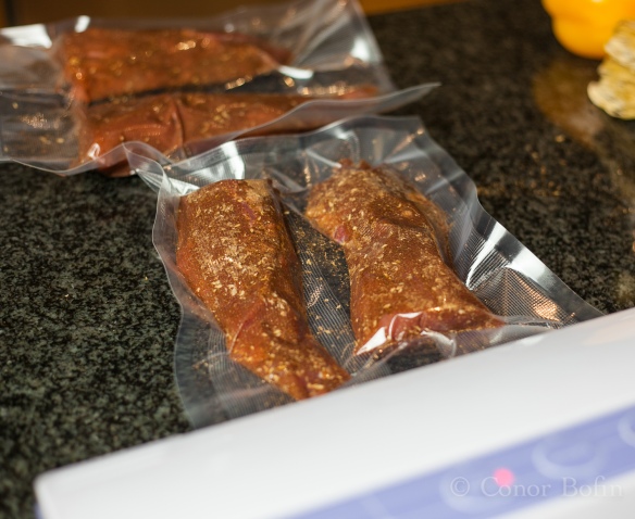 The spice is pressed into the meat when vacuum sealed.