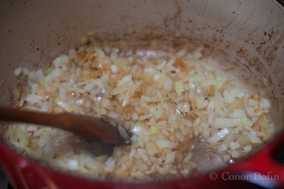 Use the onions to get those nice brown lamb bits off the bottom of the pan. 