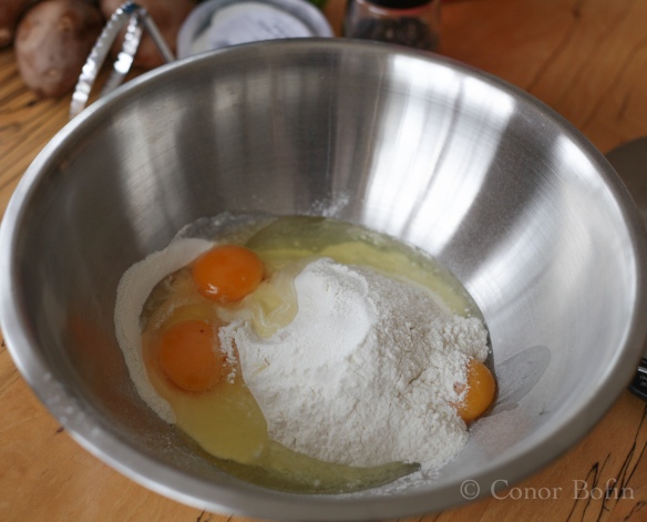 Two eggs and the yoke of a third. No butter required at this stage. 