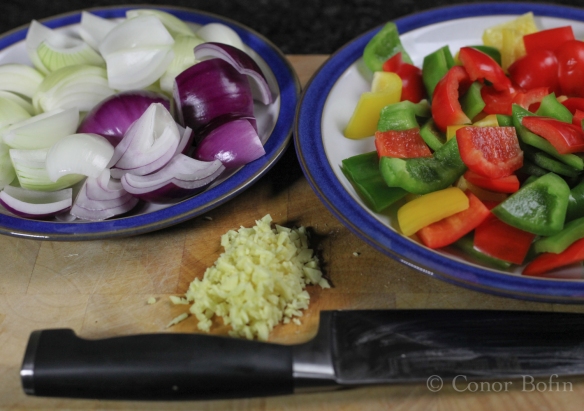 The onions and peppers should be cut chunky. The ginger nice and small.